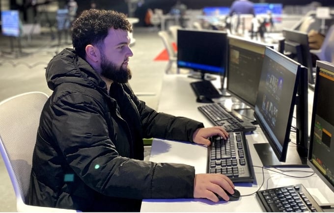 Renato seated in his work position at EuroNews TV channel