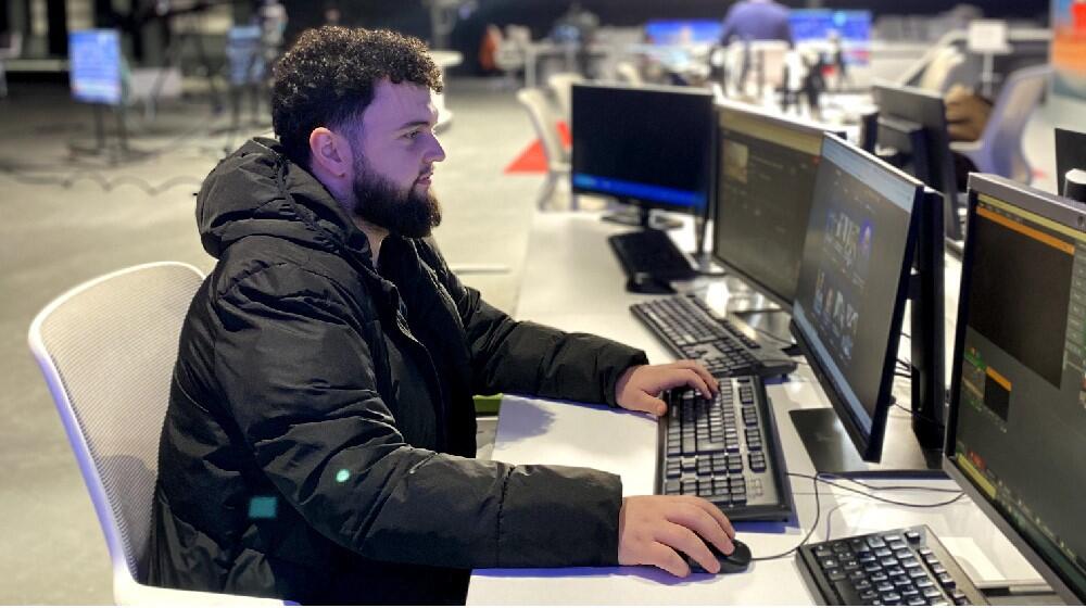 Renato seated in his work position at EuroNews TV channel